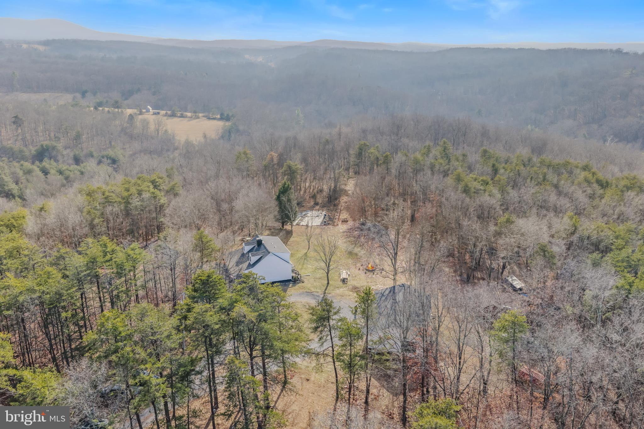 654 Soper Lane Berkeley Springs, WV 25411 - Photo 57 of 71 a view of a dry yard with trees