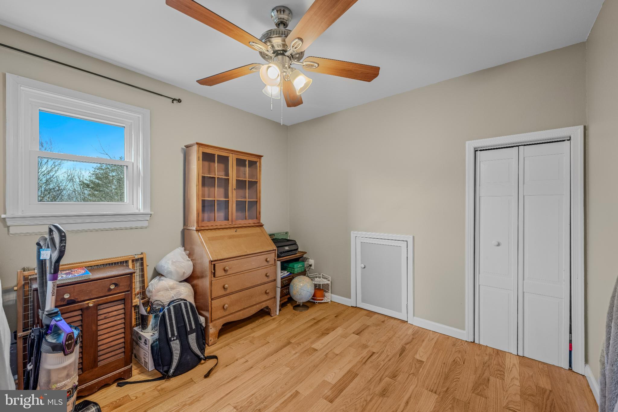 654 Soper Lane Berkeley Springs, WV 25411 - Photo 70 of 71 a bedroom with bed and a window
