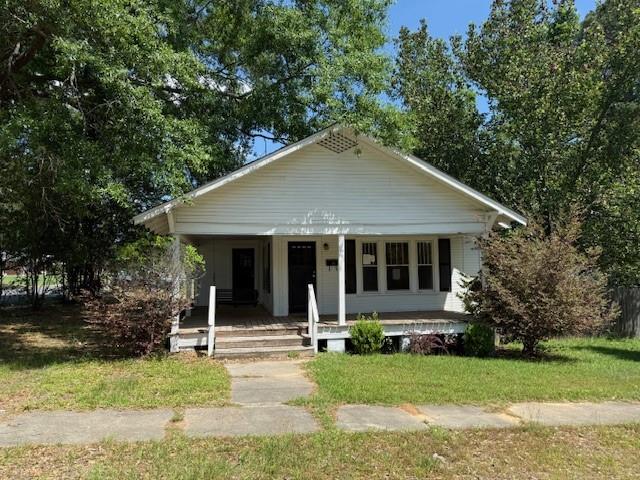115 Goode Avenue Minden, LA 71055 - Photo 1 of 12 front view of a house with a yard