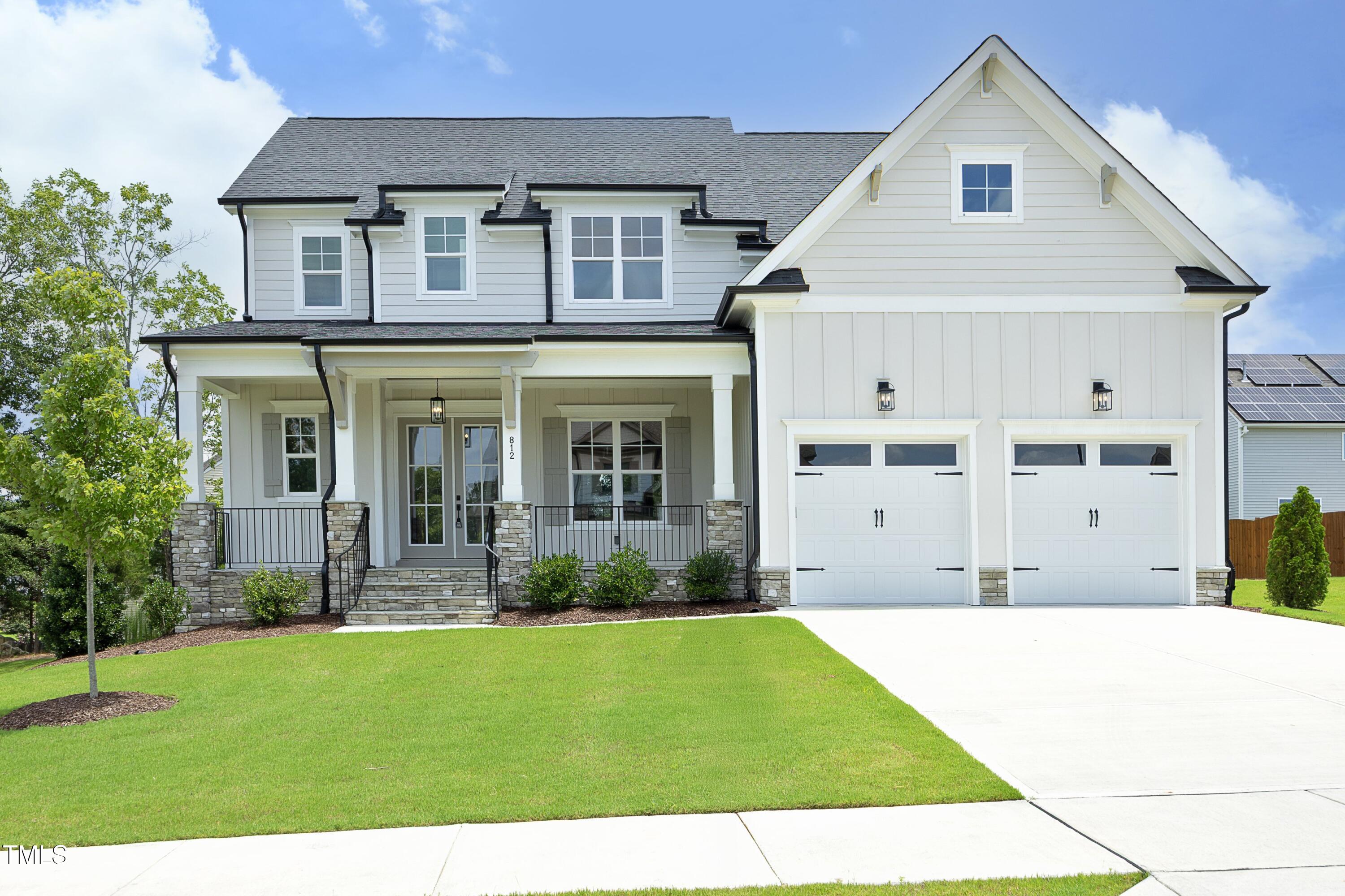 812 Willow Tower Court Rolesville, NC 27571 - Photo 1 of 43 a front view of a house with a yard