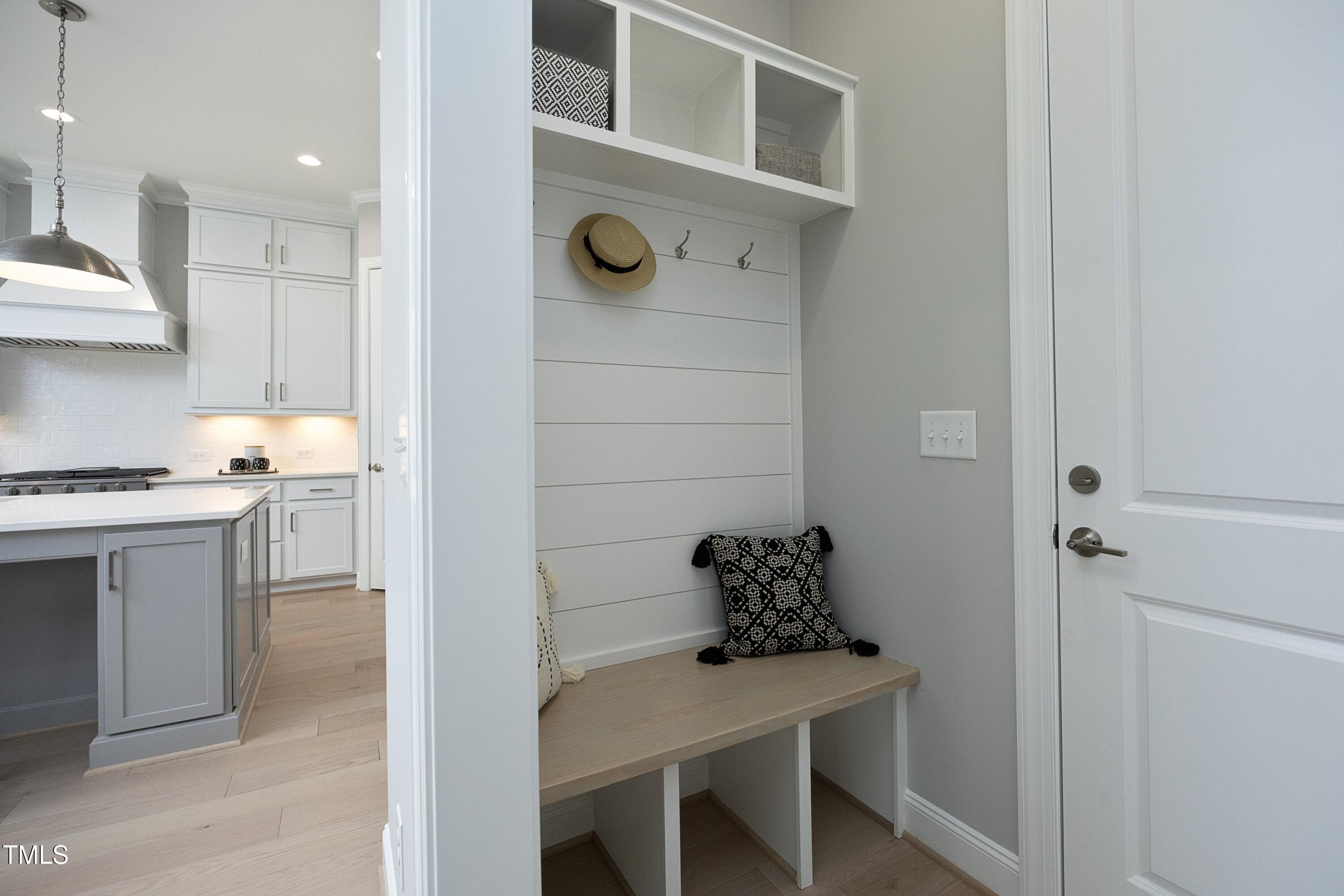 812 Willow Tower Court Rolesville, NC 27571 - Photo 18 of 43 a kitchen with a table and chairs in it