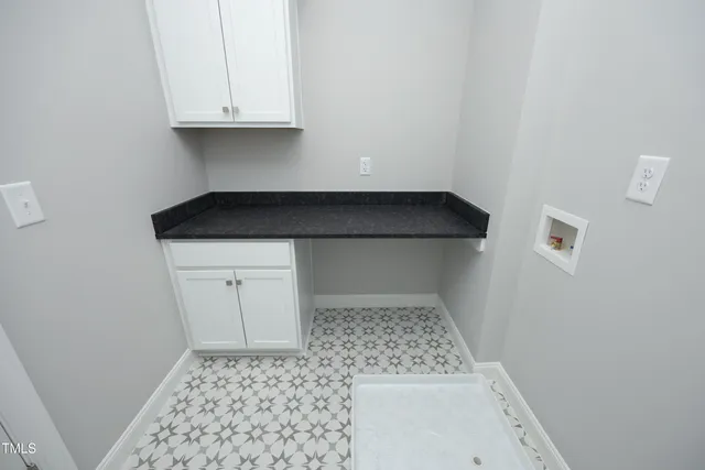 a view of a backyard house with large trees