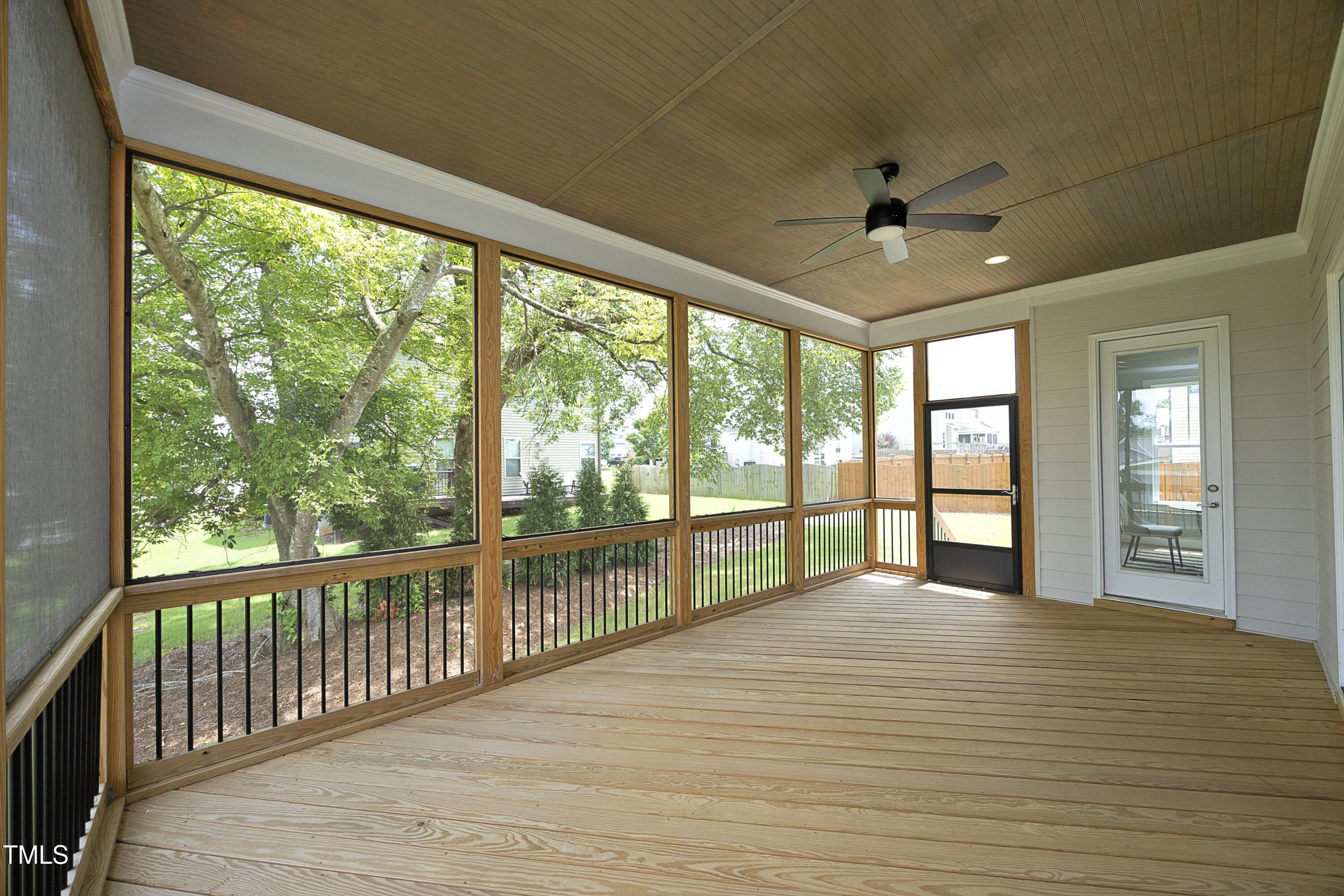 812 Willow Tower Court Rolesville, NC 27571 - Photo 37 of 43 a view of a room with wooden floor and windows