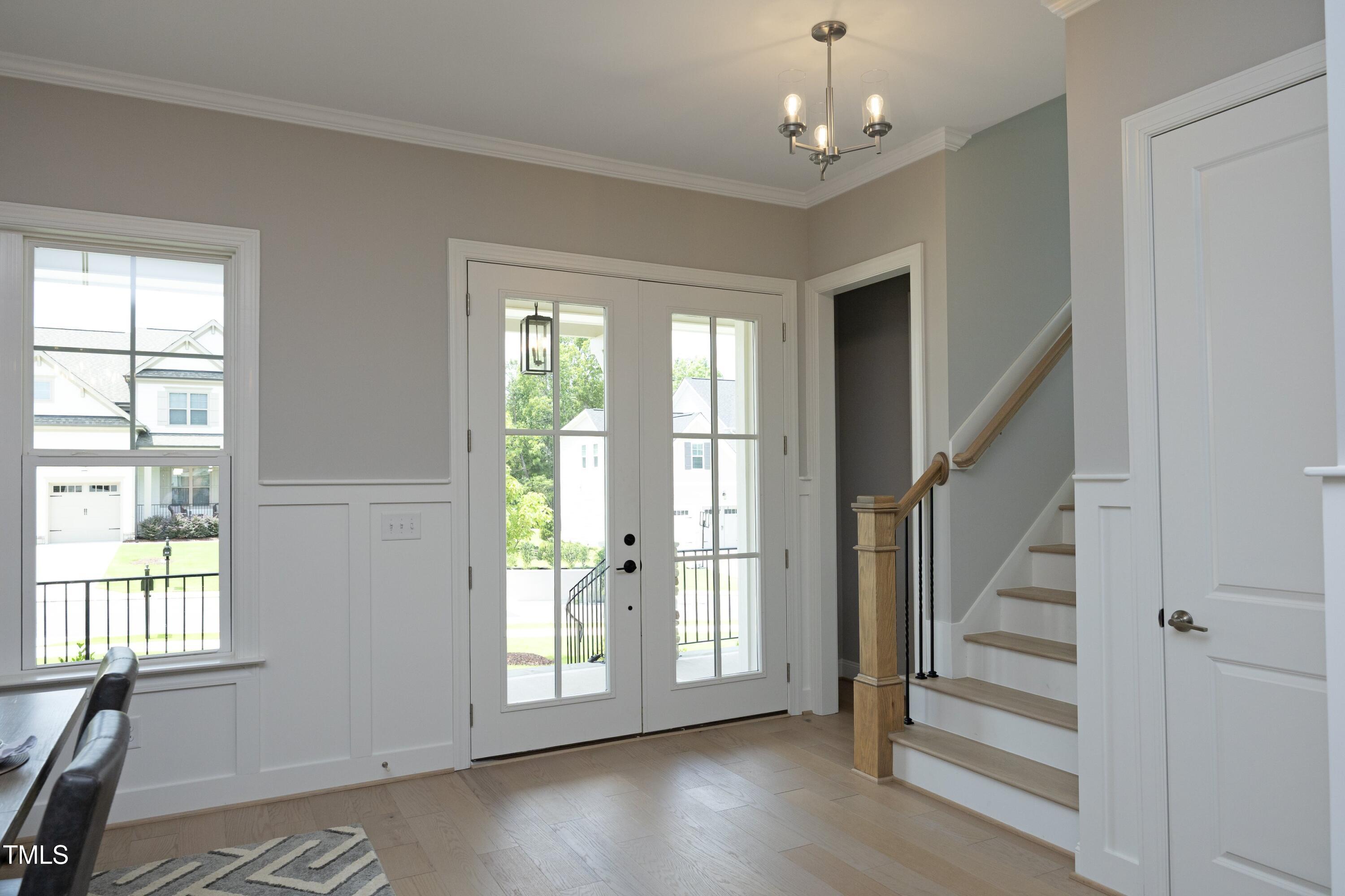 812 Willow Tower Court Rolesville, NC 27571 - Photo 4 of 43 a view of entryway with wooden floor and livingroom view