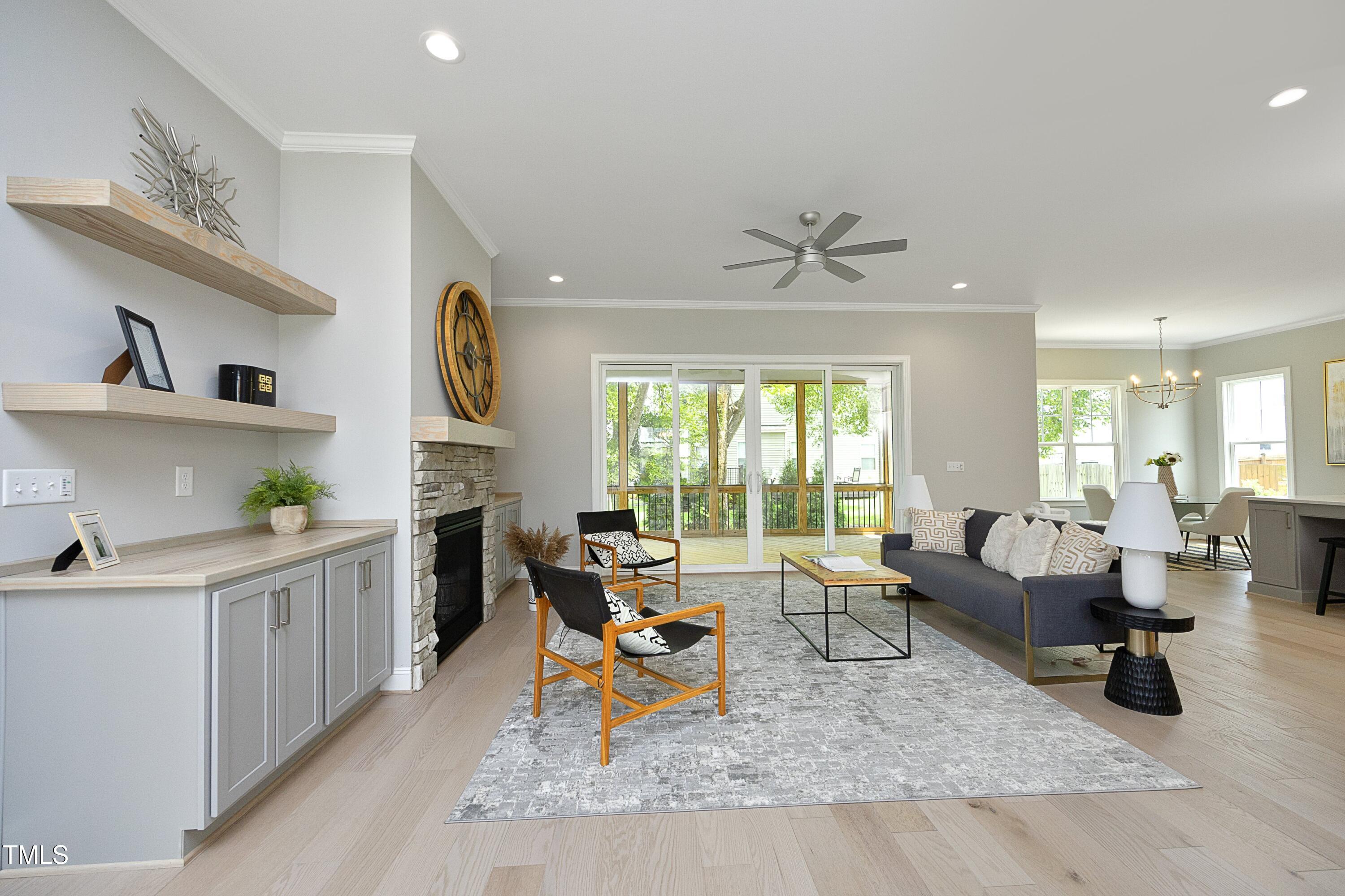812 Willow Tower Court Rolesville, NC 27571 - Photo 7 of 43 a living room with furniture and a large window