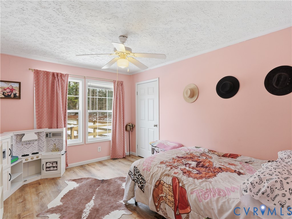 13520 Dykeland Road Amelia Court House, VA 23002 - Photo 16 of 33 a bedroom with a bed and a window