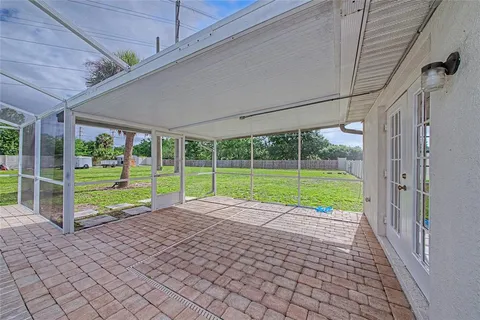 a view of a room with wooden fence