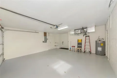 a view of a storage & utility room with two washing machine