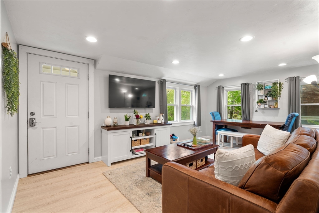 7 Indian Neck Road Wareham, MA 02571 - Photo 21 of 34 a living room with furniture and a flat screen tv