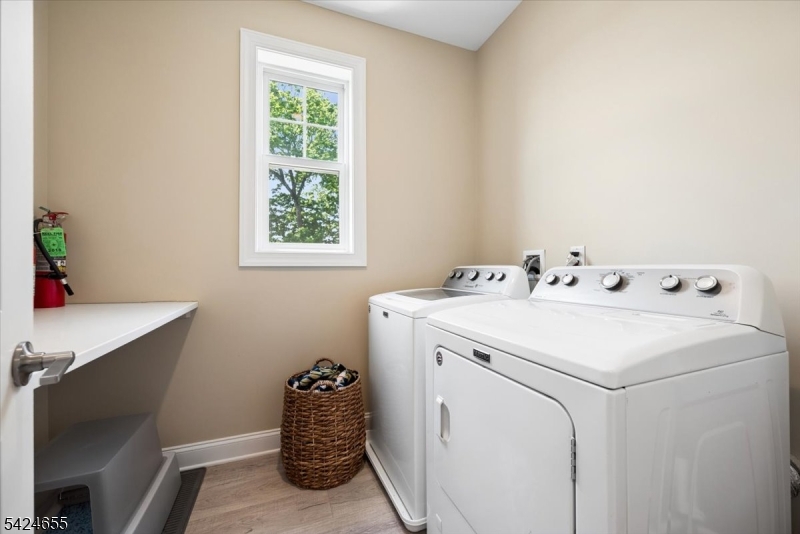 401 Mariners Pointe Hopatcong, NJ 07843 - Photo 24 of 42 a utility room with dryer and washer