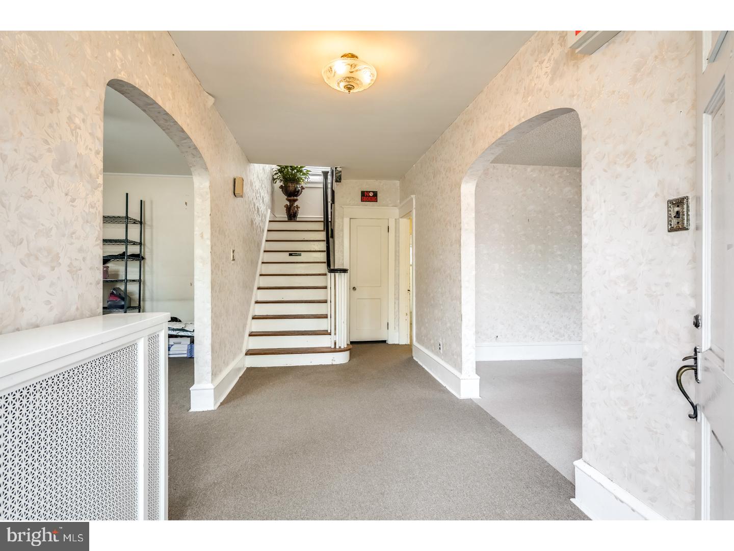 213 Clements Bridge Road Barrington, NJ 08007 - Photo 2 of 25 a view of a hardwood floor and staircase in a kitchen