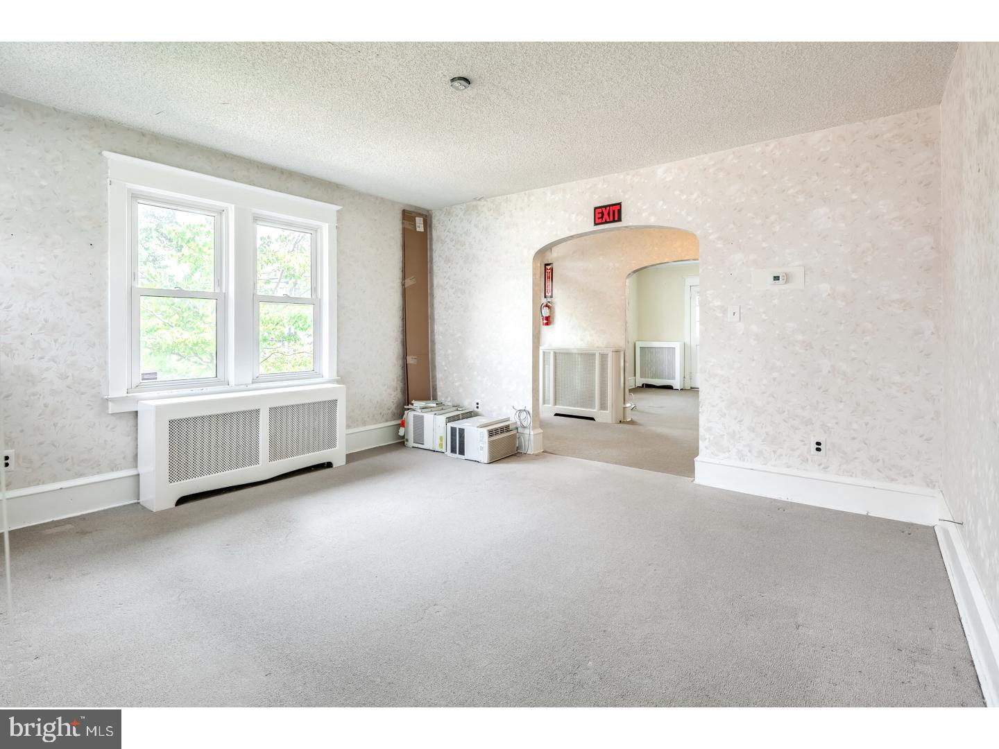 213 Clements Bridge Road Barrington, NJ 08007 - Photo 5 of 25 a view of empty room with a fireplace