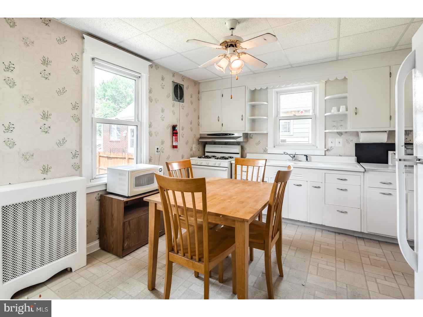 213 Clements Bridge Road Barrington, NJ 08007 - Photo 8 of 25 a view of a dining room with furniture and window