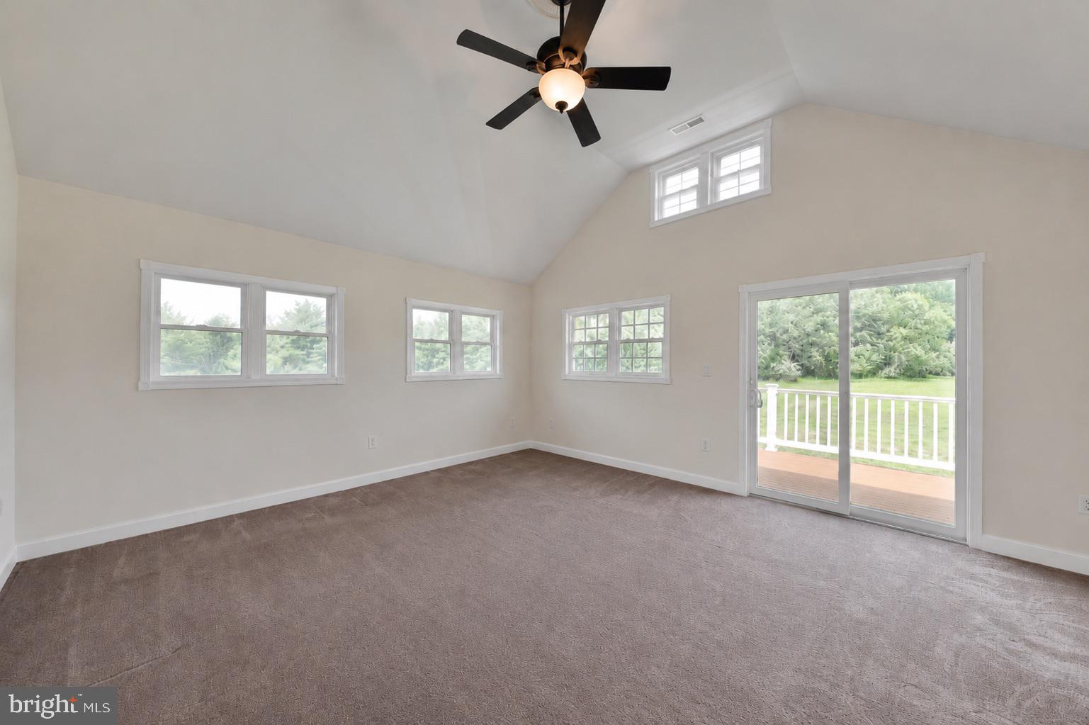 715 Bucks Road Perkasie, PA 18944 - Photo 38 of 55 Primary Suite Sitting Room with Sliders to Deck