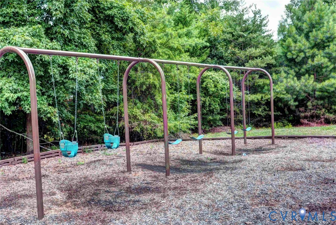4015 Cold Spring Road Williamsburg, VA 23188 - Photo 57 of 57 Outdoor swing set featuring four swings, two with