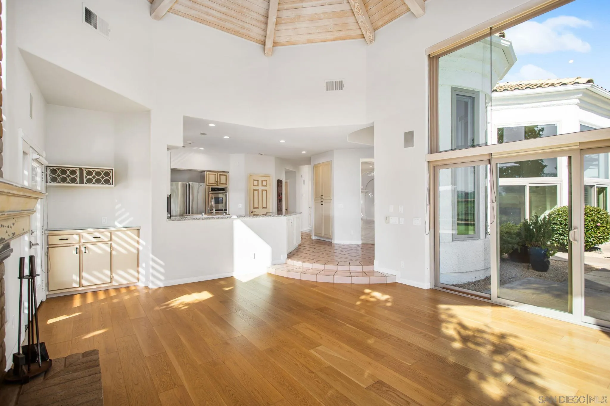 4489 Fallsbrae Road Fallbrook, CA 92028 - Photo 13 of 46 a view of a livingroom with wooden floor and furniture
