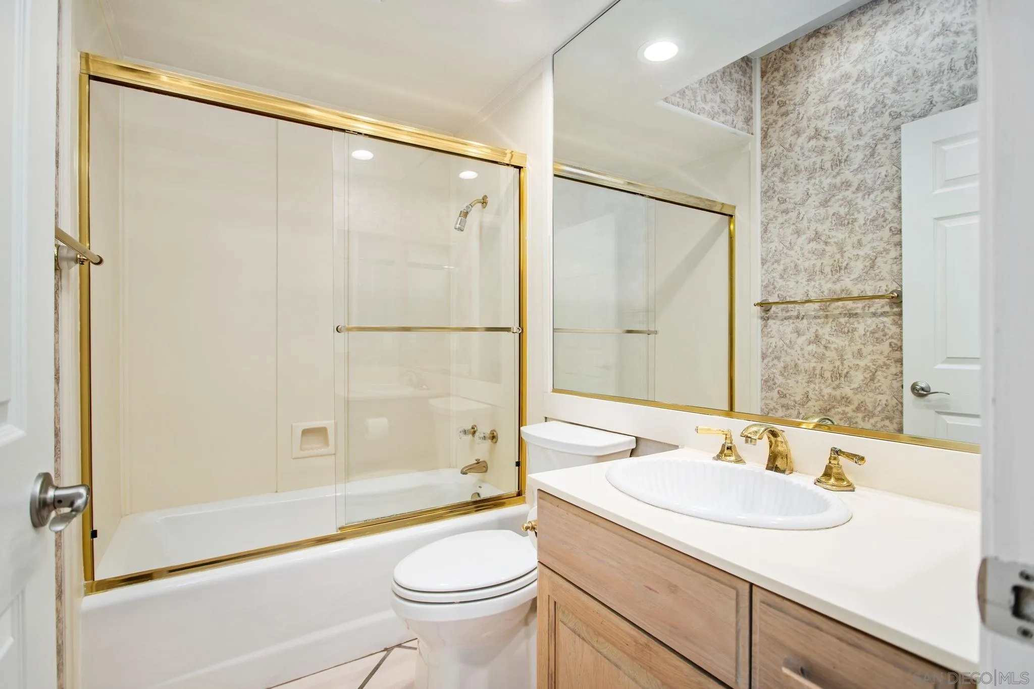 4489 Fallsbrae Road Fallbrook, CA 92028 - Photo 26 of 46 a bathroom with a sink toilet and shower