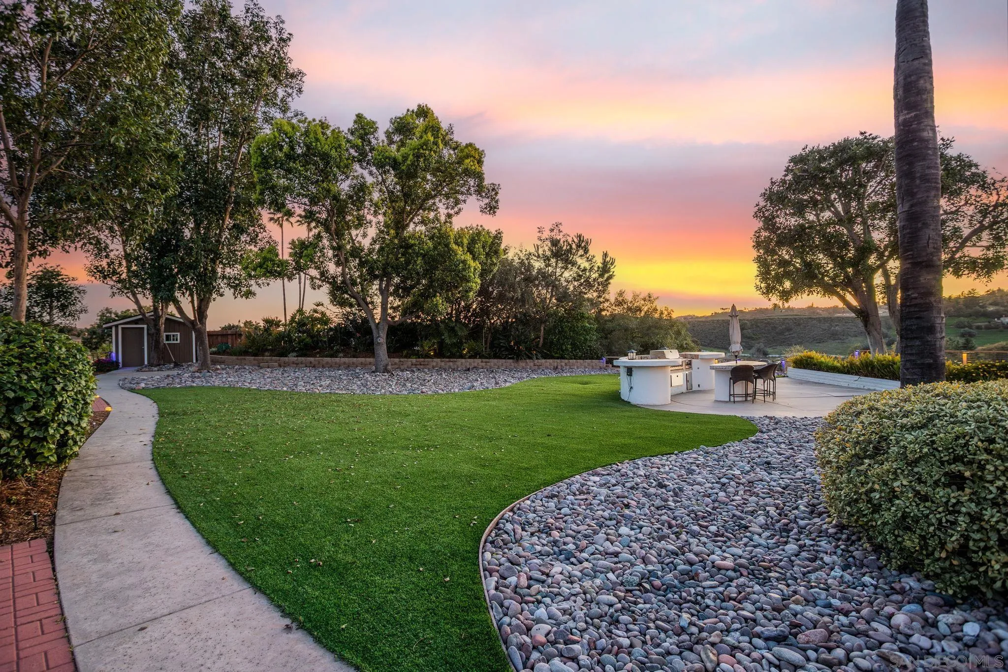 4489 Fallsbrae Road Fallbrook, CA 92028 - Photo 29 of 46 a view of a garden with trees