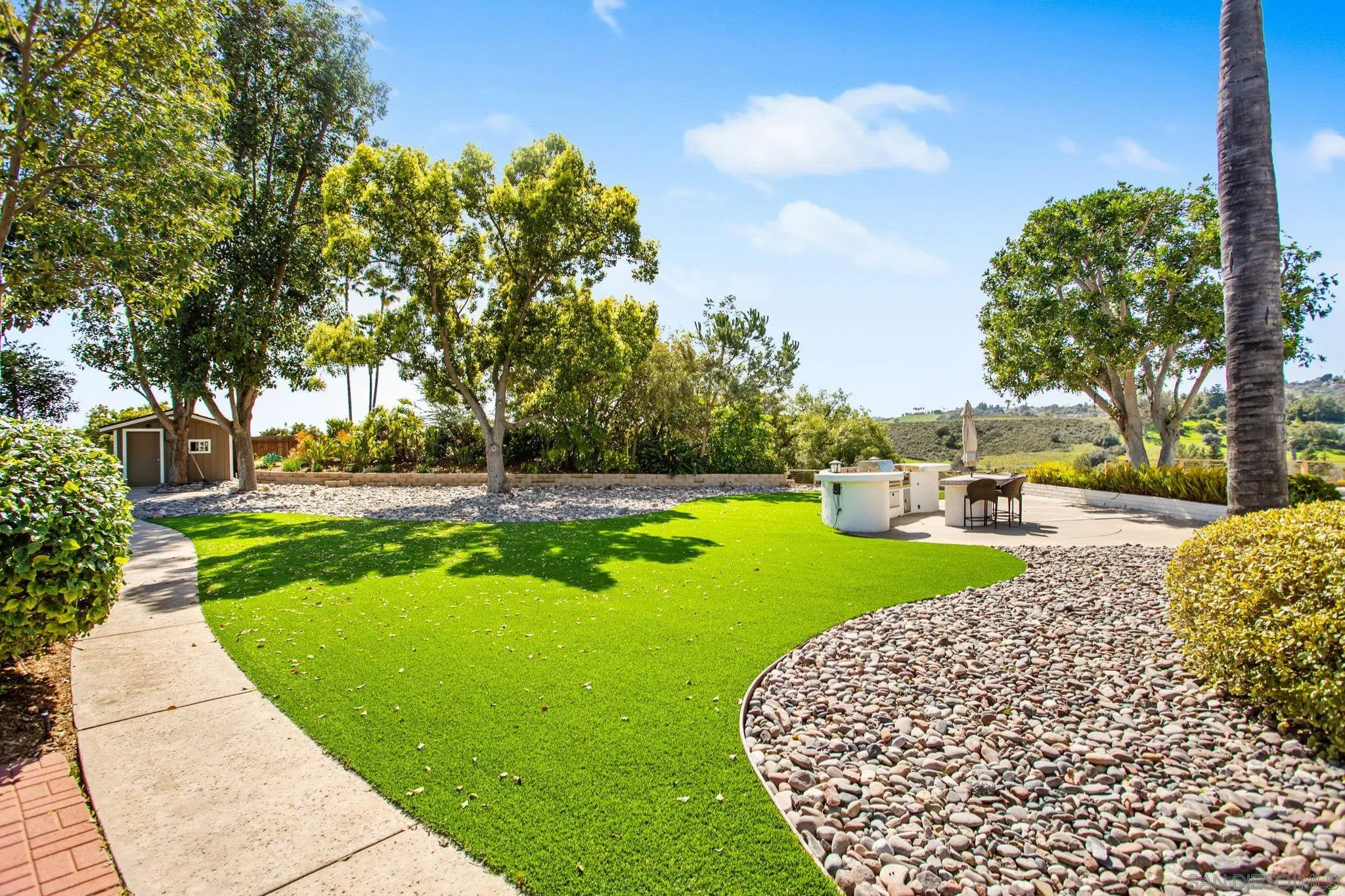 4489 Fallsbrae Road Fallbrook, CA 92028 - Photo 38 of 46 a view of a garden with houses