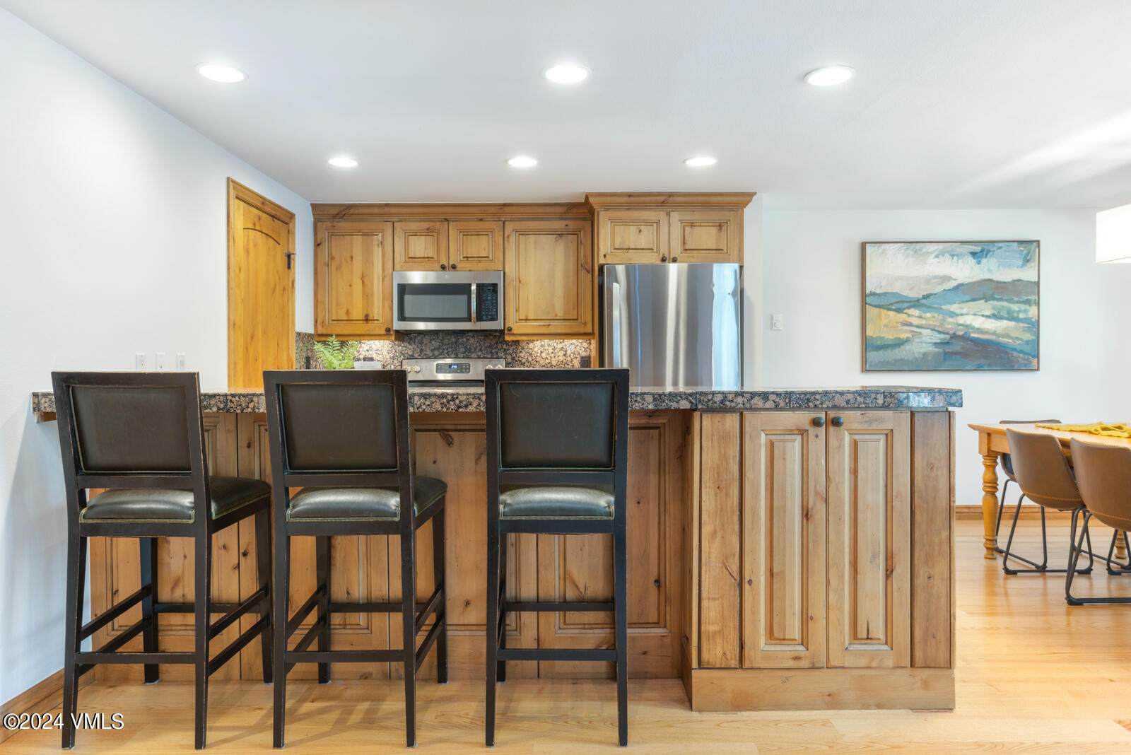 4552 Meadow Drive, Unit 24 Vail, CO 81657 - Photo 11 of 31 a dining room with furniture and a window