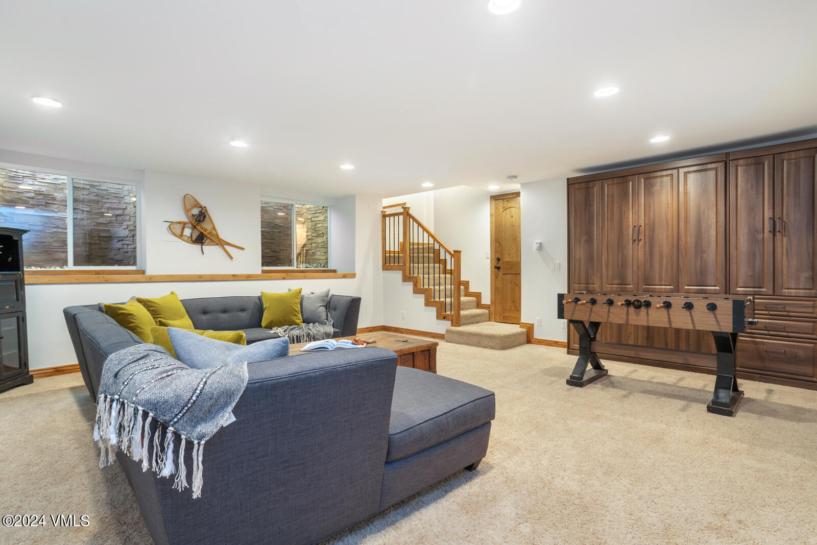 4552 Meadow Drive, Unit 24 Vail, CO 81657 - Photo 15 of 31 a living room with furniture and a large window
