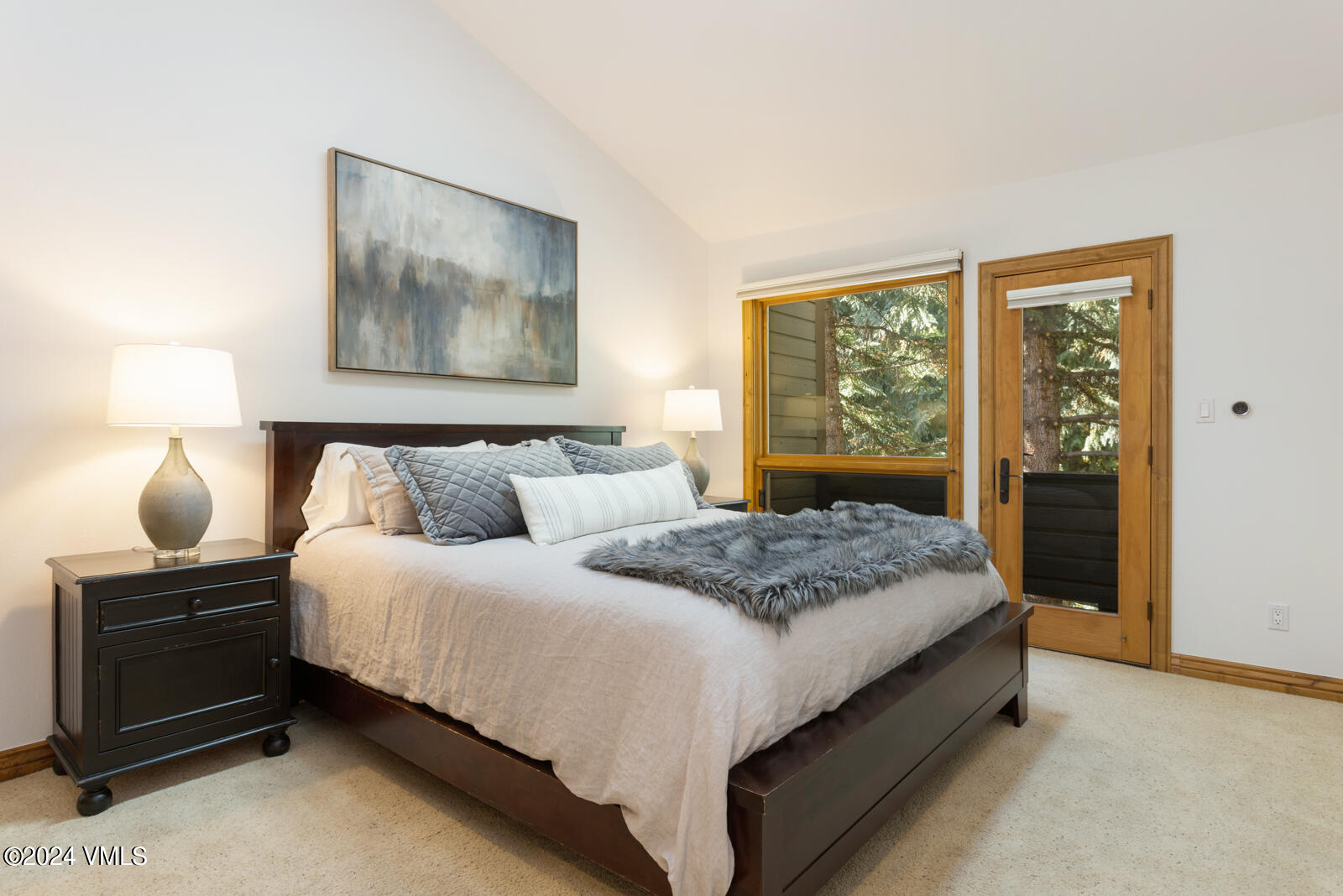 4552 Meadow Drive, Unit 24 Vail, CO 81657 - Photo 16 of 31 a bedroom with bed and window