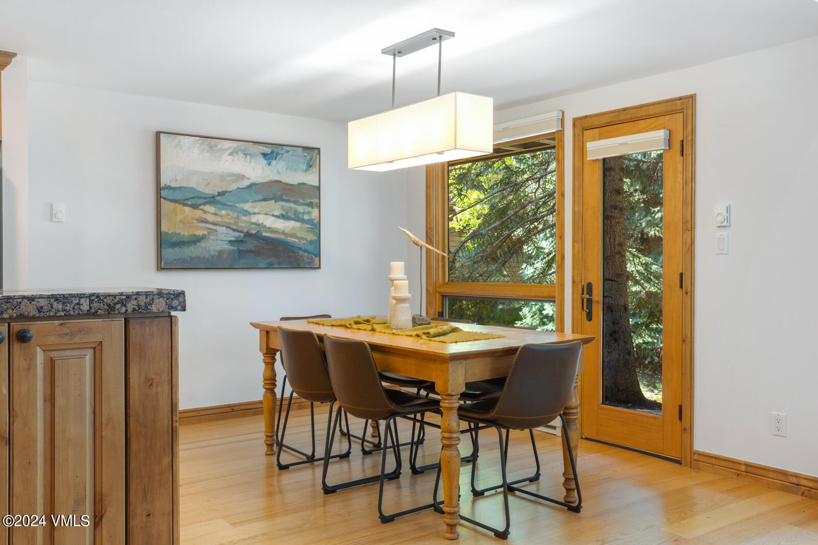 4552 Meadow Drive, Unit 24 Vail, CO 81657 - Photo 5 of 31 a view of a dining room with furniture window and outside view