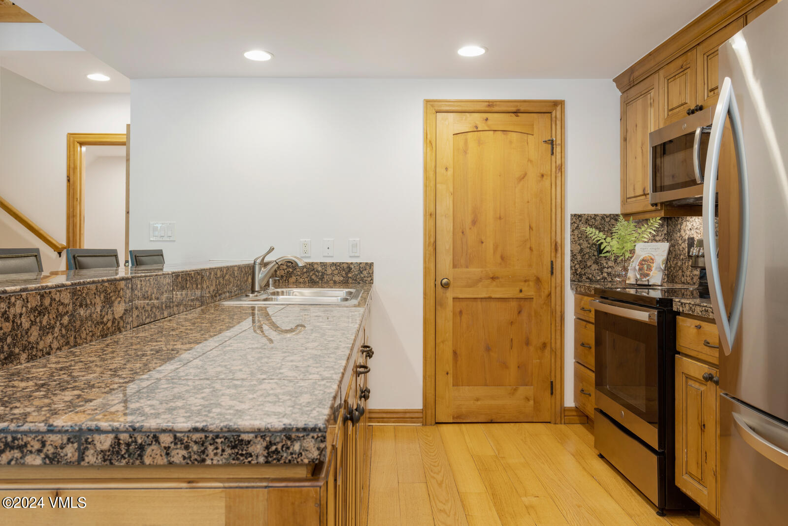 4552 Meadow Drive, Unit 24 Vail, CO 81657 - Photo 8 of 31 a view of a kitchen with a sink