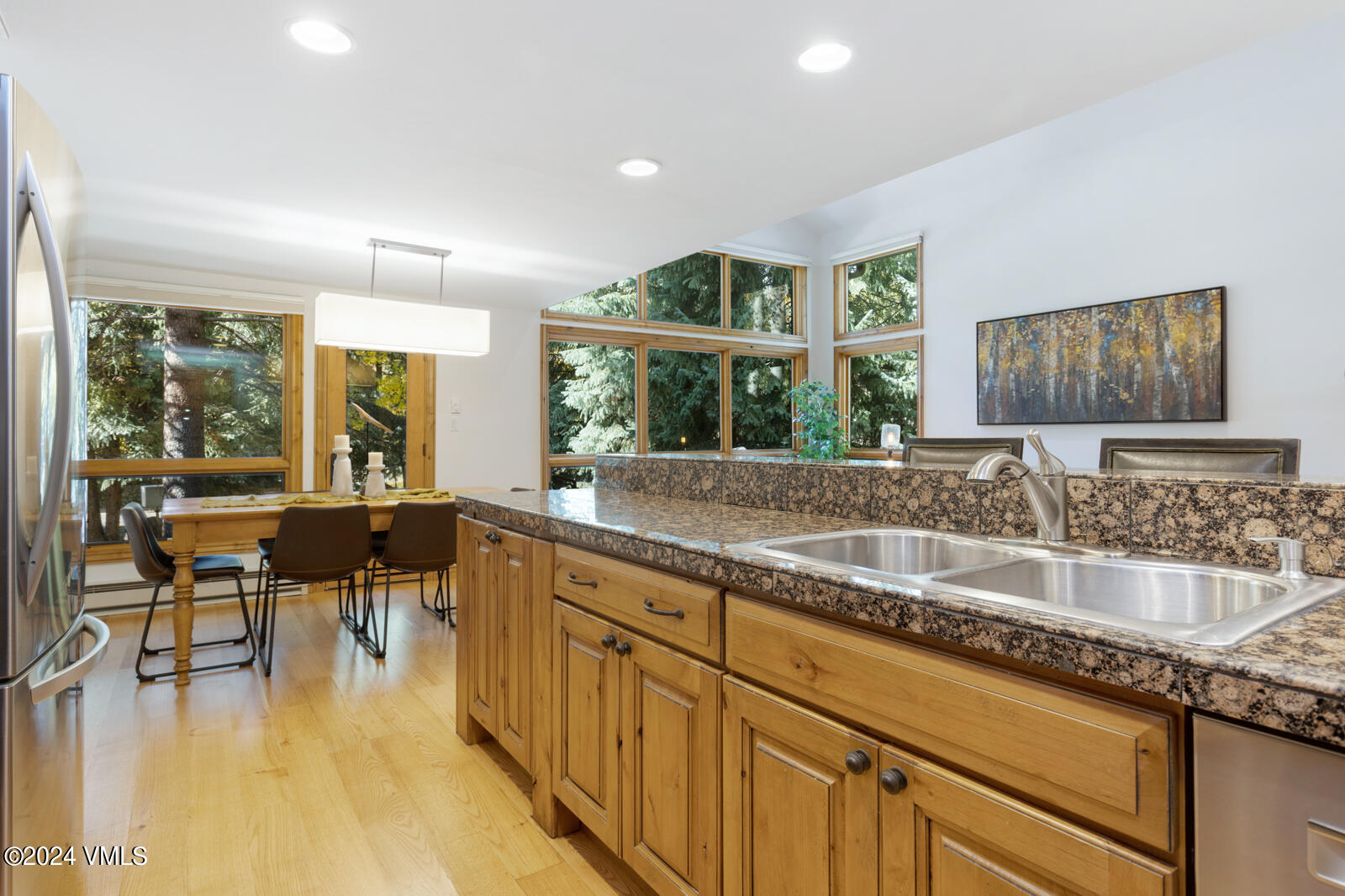 4552 Meadow Drive, Unit 24 Vail, CO 81657 - Photo 10 of 31 a kitchen with sink and view of living room
