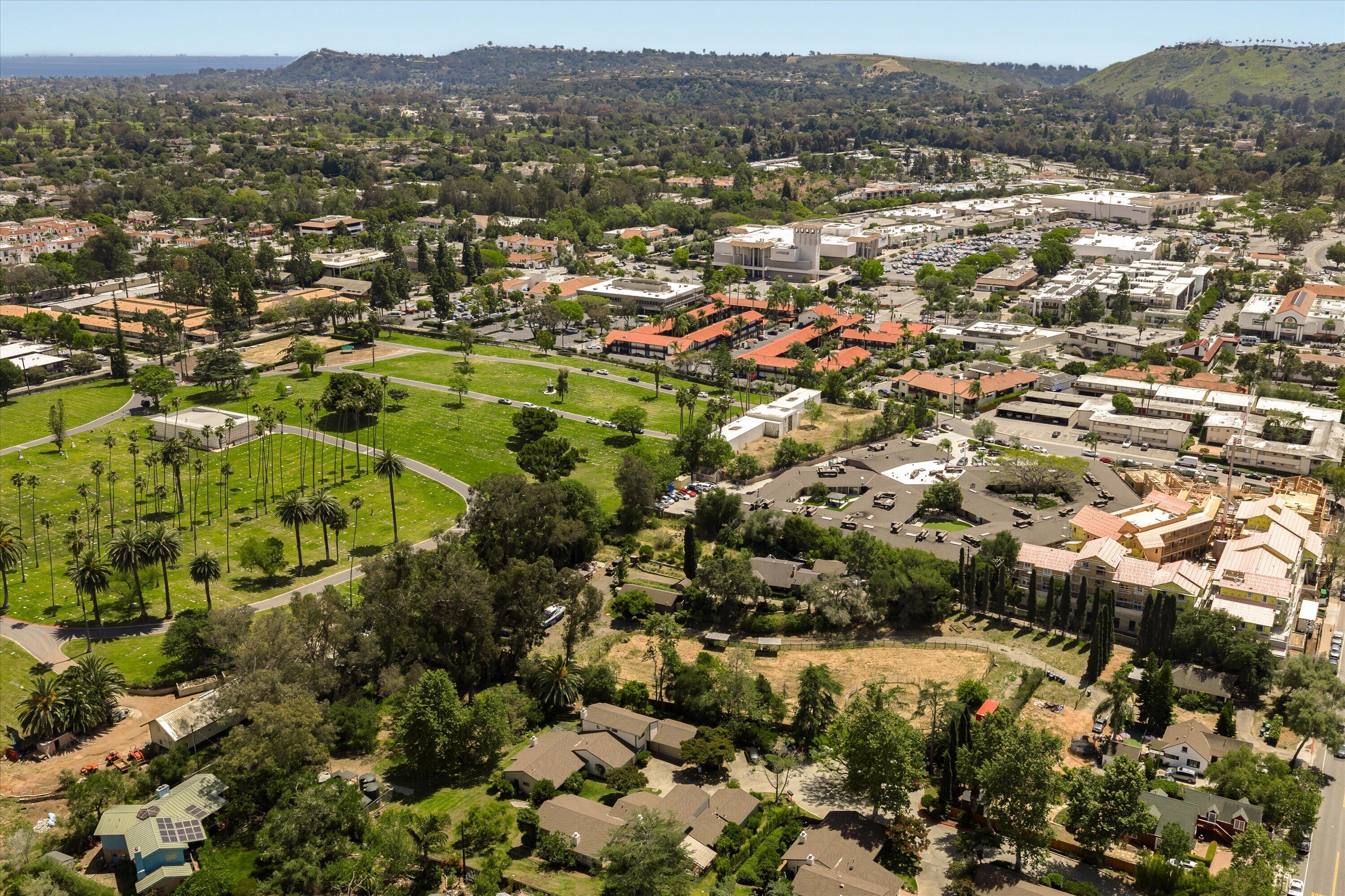 276 North La Cumbre Road Santa Barbara, CA 93110 - Photo 15 of 16 an aerial view of residential houses with outdoor space and trees