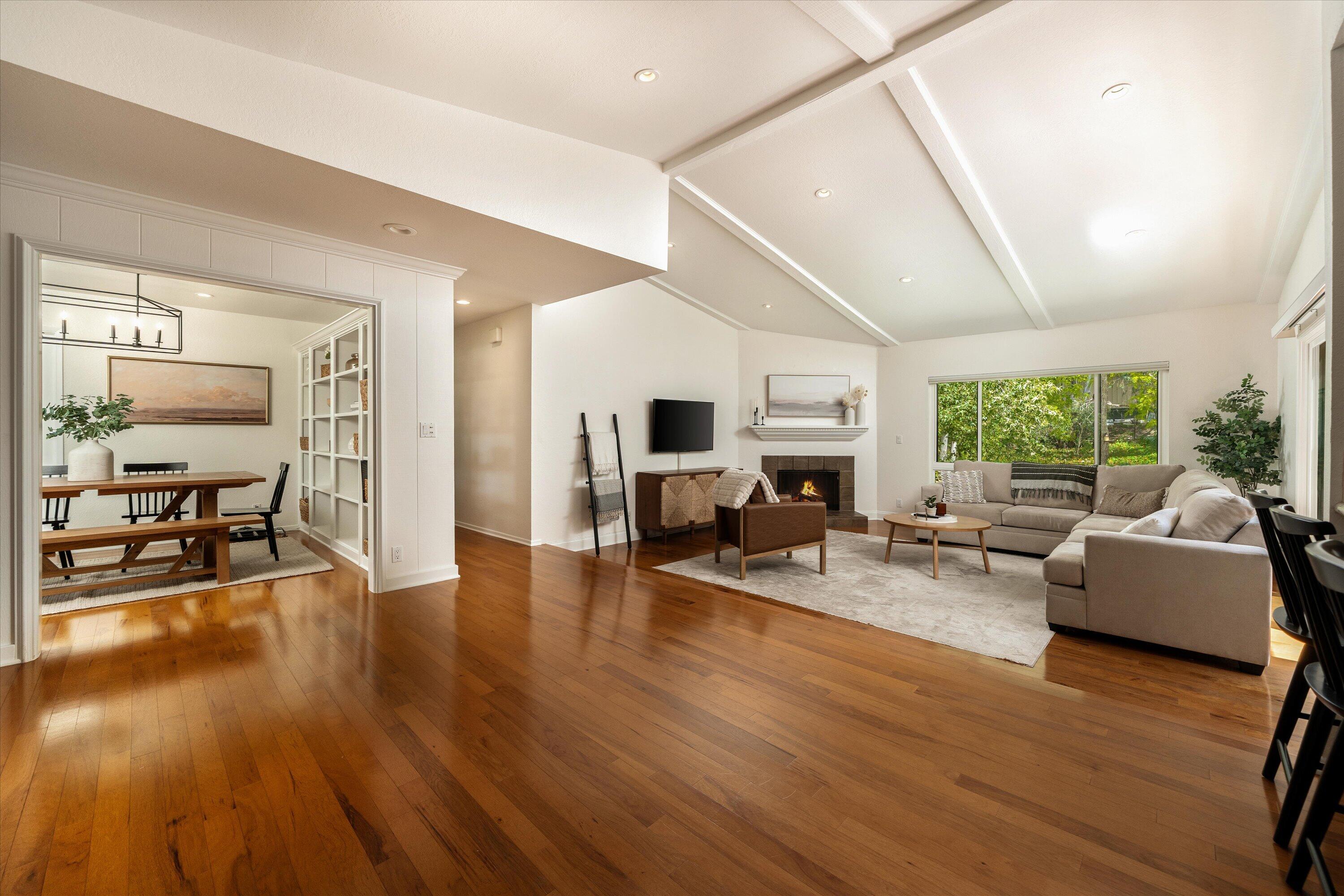 276 North La Cumbre Road Santa Barbara, CA 93110 - Photo 4 of 16 a living room with fireplace furniture and a wooden floor