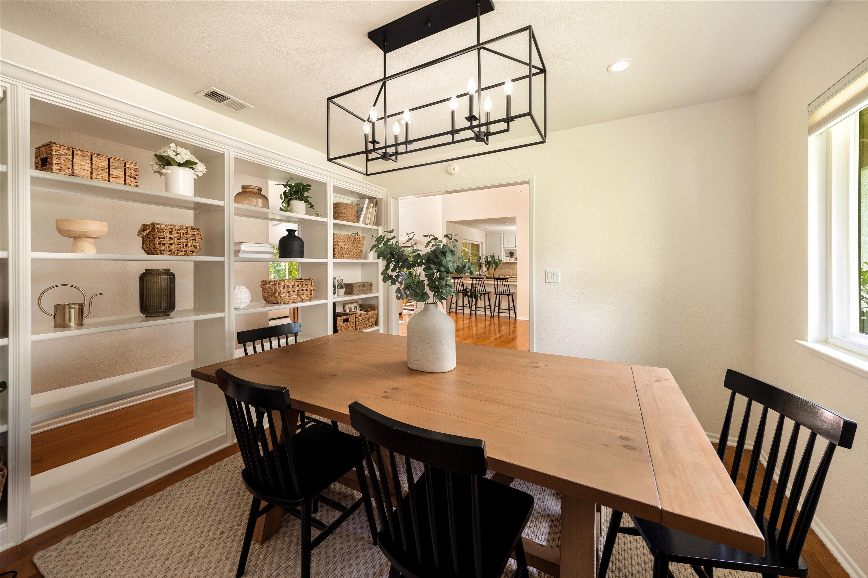 276 North La Cumbre Road Santa Barbara, CA 93110 - Photo 7 of 16 a view of a dining table and chairs in the room