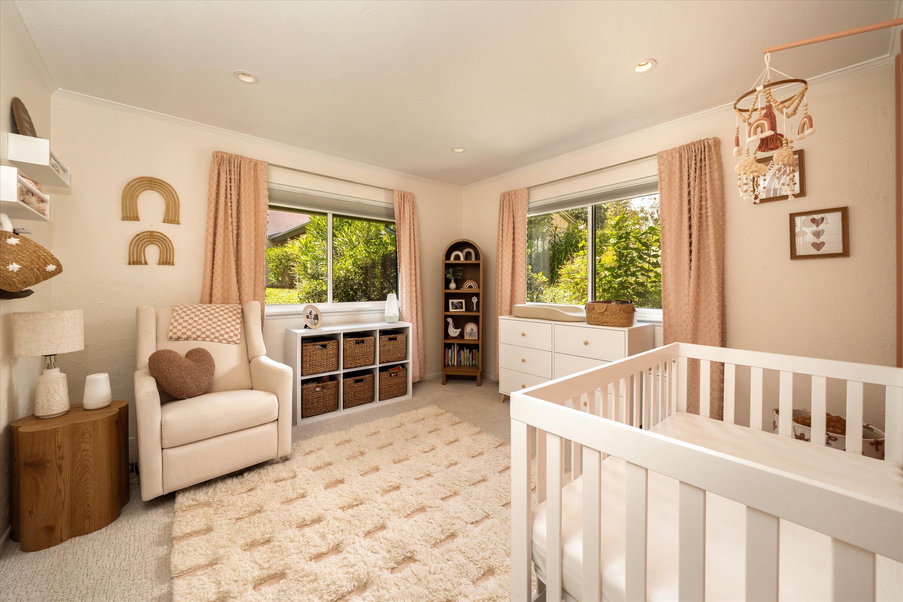 276 North La Cumbre Road Santa Barbara, CA 93110 - Photo 10 of 16 a living room with furniture and a large window