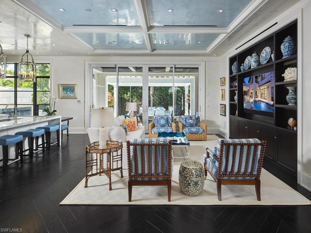 167 4th Street North Naples, FL 34102 - Photo 4 of 33 a view of a dining room with furniture window and outside view
