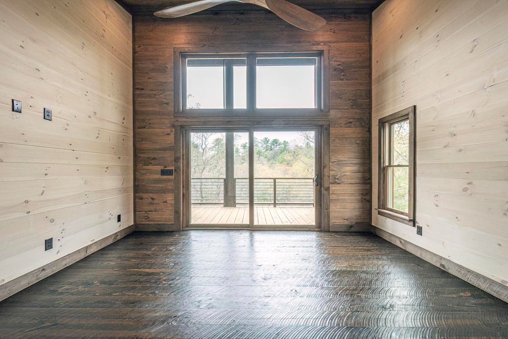 506 Pony Ghost Trail Blue Ridge, GA 30513 - Photo 33 of 62 wooden floor in an empty room with a window