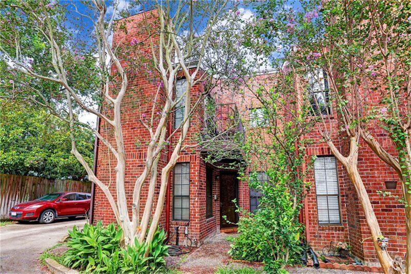 2732 West Holcombe Boulevard Houston, TX 77025 - Photo 1 of 12 an outdoor view of a house with a yard