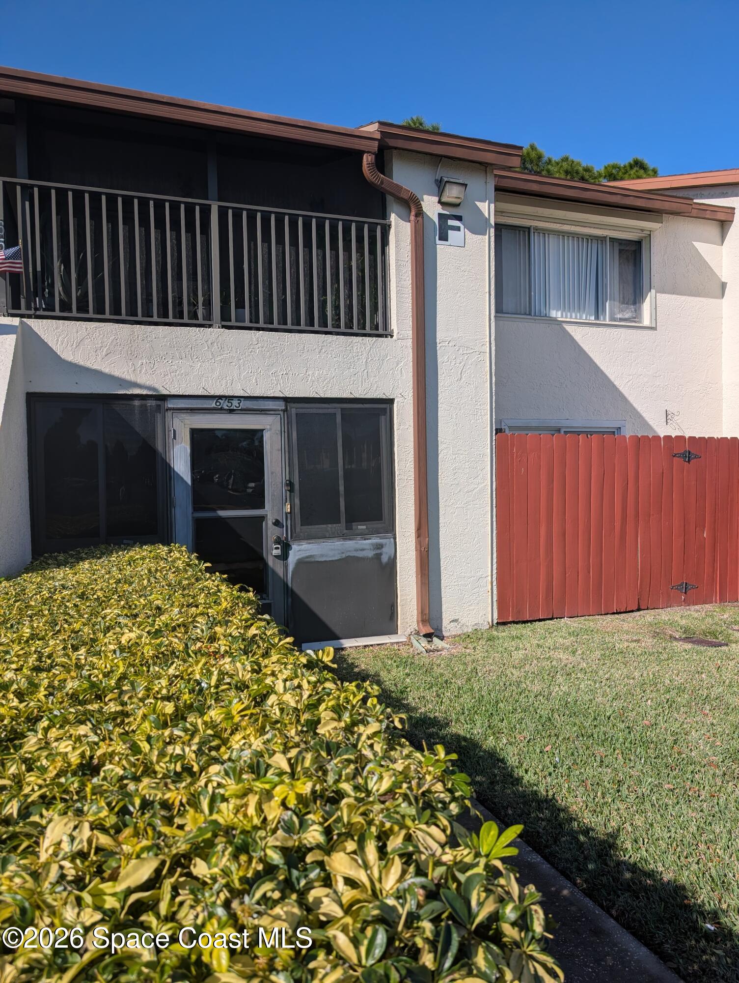 a view of a backyard with a garden