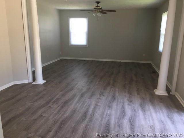 434 Saddle Ridge Road Fayetteville, NC 28311 - Photo 3 of 16 an empty room with wooden floor and windows
