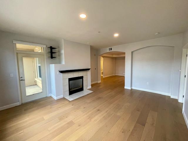 30 East Julian Street, Unit 201 San Jose, CA 95112 - Photo 7 of 25 a view of a livingroom with a fireplace