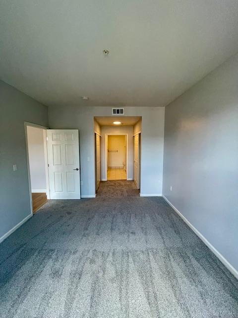 30 East Julian Street, Unit 201 San Jose, CA 95112 - Photo 10 of 25 an empty room with a empty space and windows