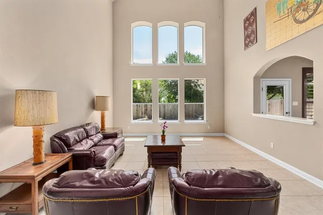 a kitchen with stainless steel appliances a stove sink and cabinets
