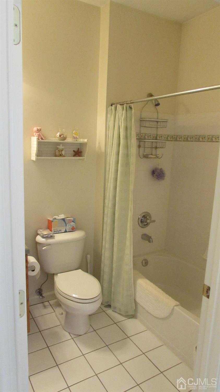 91 Wordsworth Road Brick, NJ 08724 - Photo 12 of 41 a bathroom with a toilet and a shower