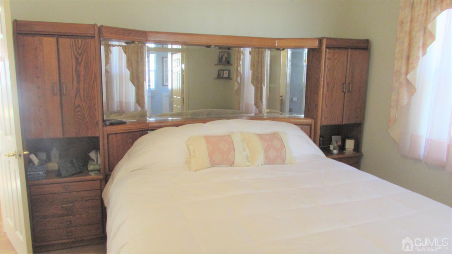 91 Wordsworth Road Brick, NJ 08724 - Photo 28 of 41 a bedroom with a bed and a window