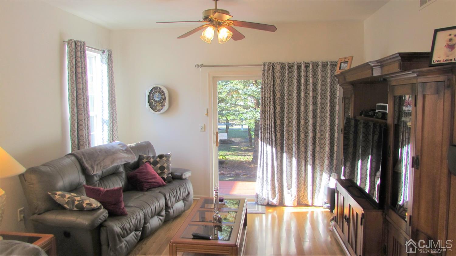 91 Wordsworth Road Brick, NJ 08724 - Photo 37 of 41 a living room with furniture and a window