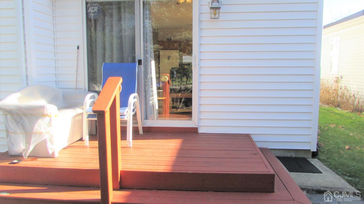 91 Wordsworth Road Brick, NJ 08724 - Photo 41 of 41 a view of a balcony with door