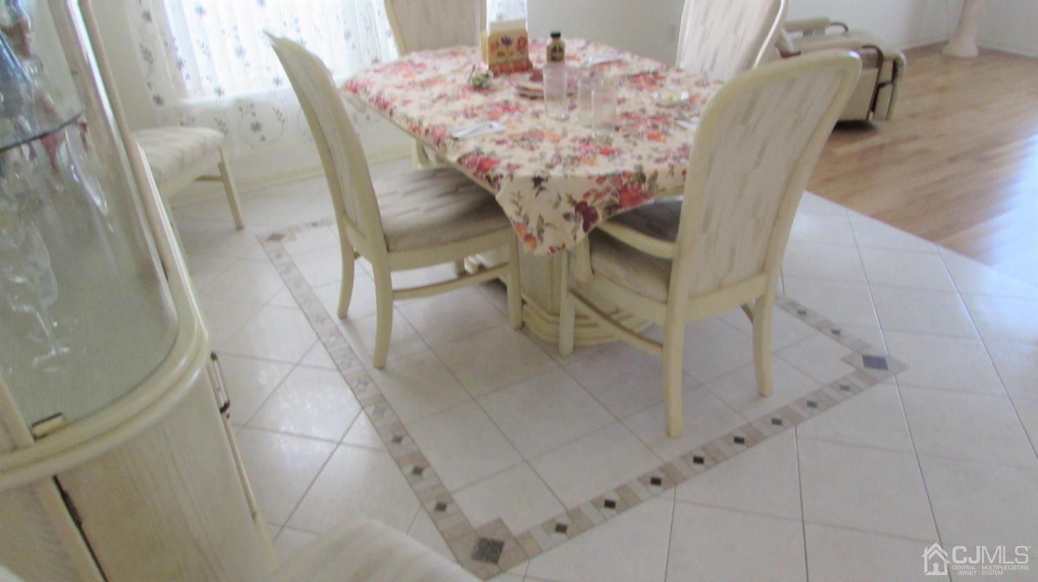 91 Wordsworth Road Brick, NJ 08724 - Photo 7 of 41 a view of a dining room with furniture