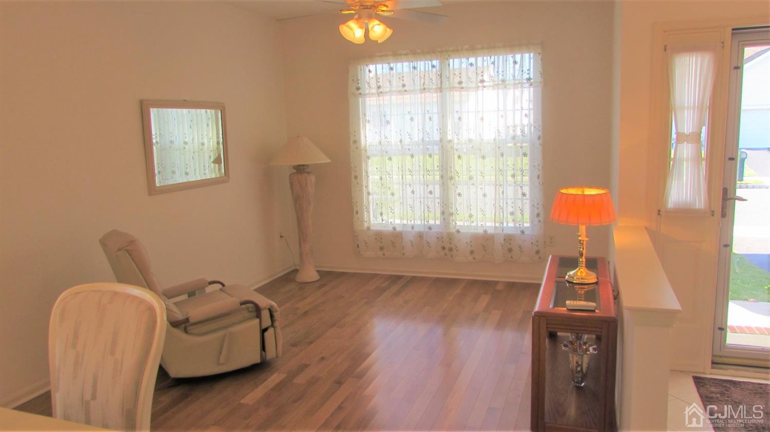 91 Wordsworth Road Brick, NJ 08724 - Photo 8 of 41 a living room with furniture and a window