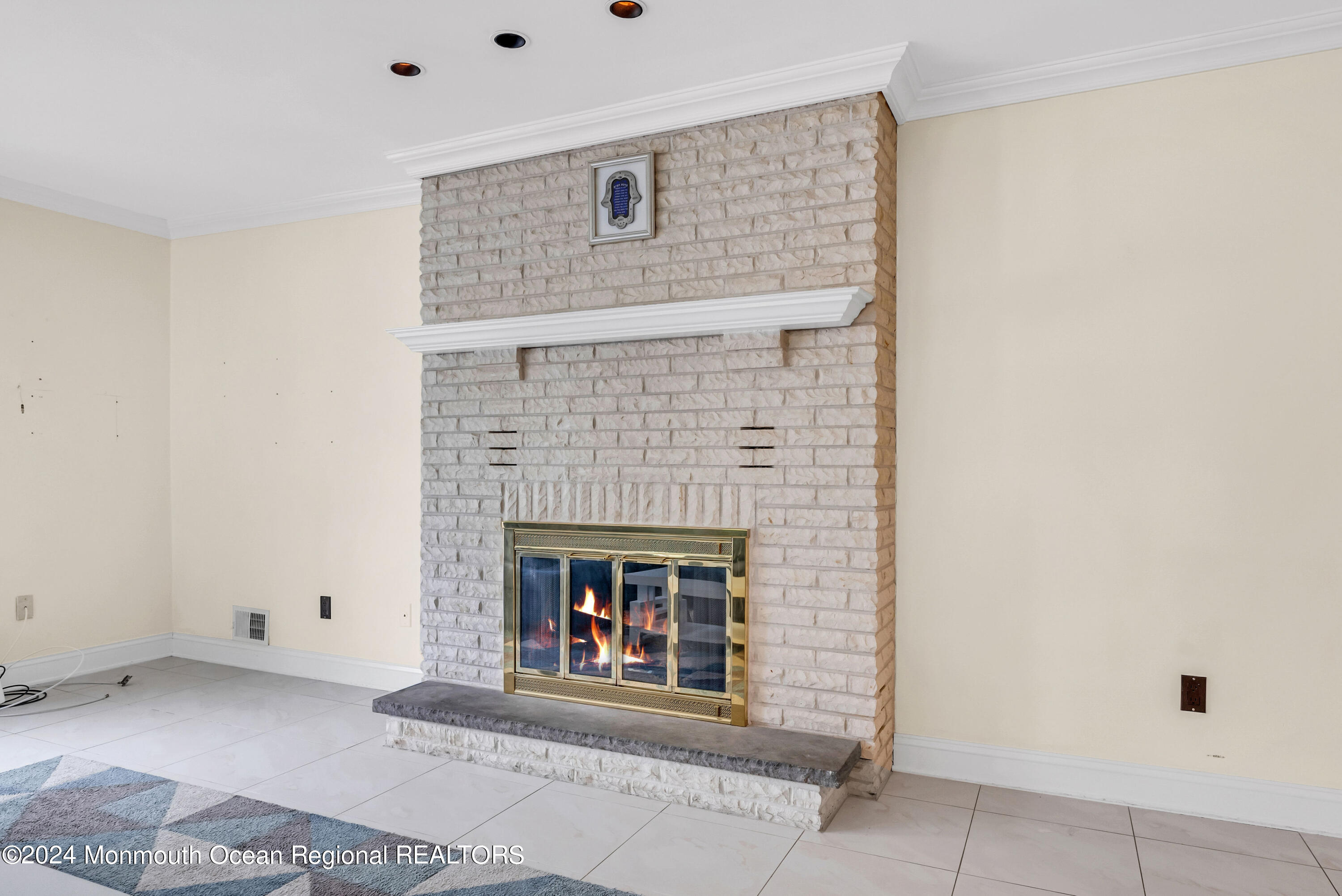 7 Decamp Court West Long Branch, NJ 07764 - Photo 20 of 32 a living room with a fireplace