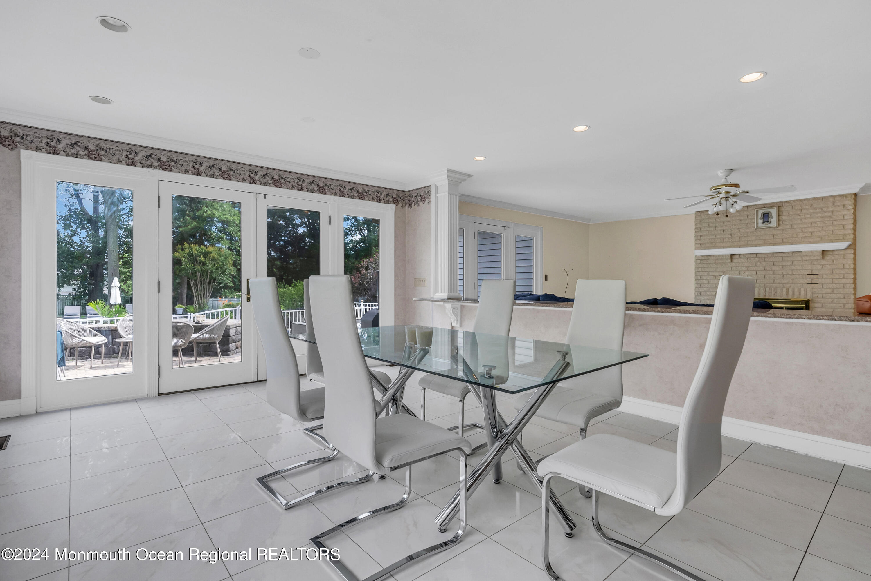 7 Decamp Court West Long Branch, NJ 07764 - Photo 22 of 32 a dining room with furniture and large windows
