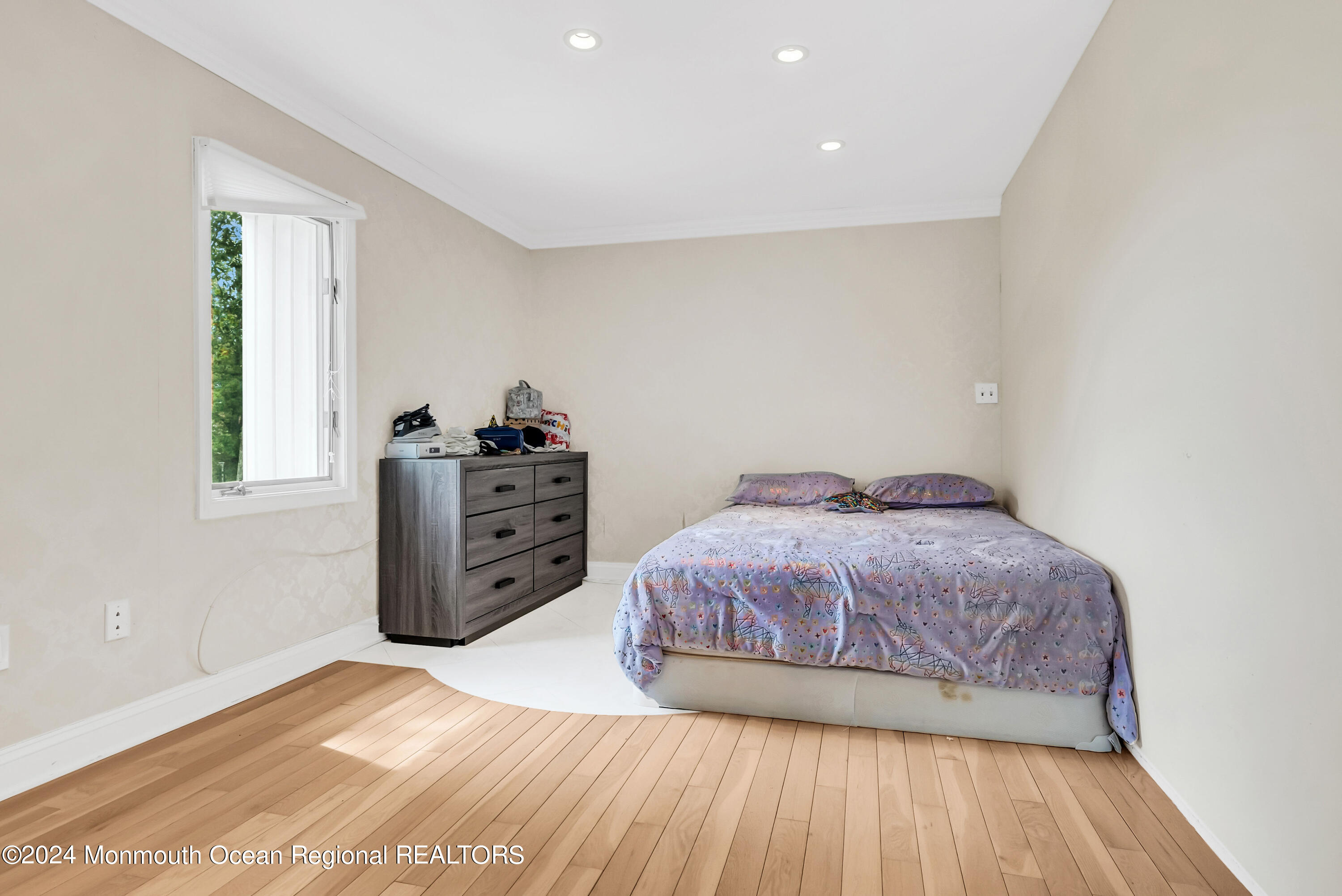 7 Decamp Court West Long Branch, NJ 07764 - Photo 23 of 32 a bedroom with a bed and a cabinets